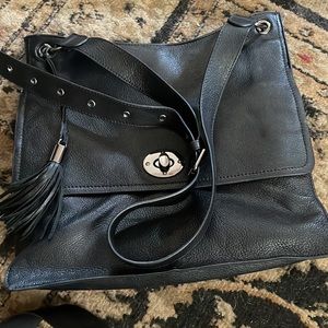 Black leather shoulder bag/crossbody bag.